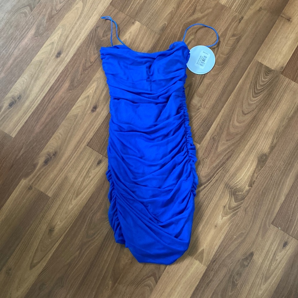 Brand New Princess Polly Dress with tags. Strap needs to be sewn back on